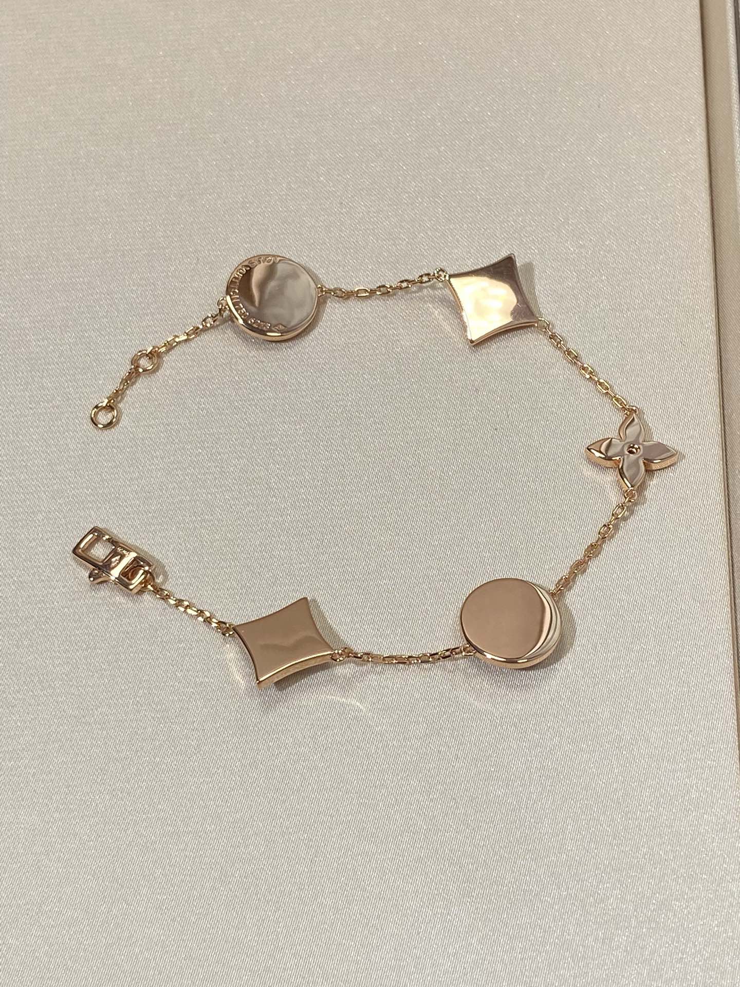 [Pearl Jewelrys]STAR AND SUN 5 MOTIF MOP PINK GOLD BRACELET