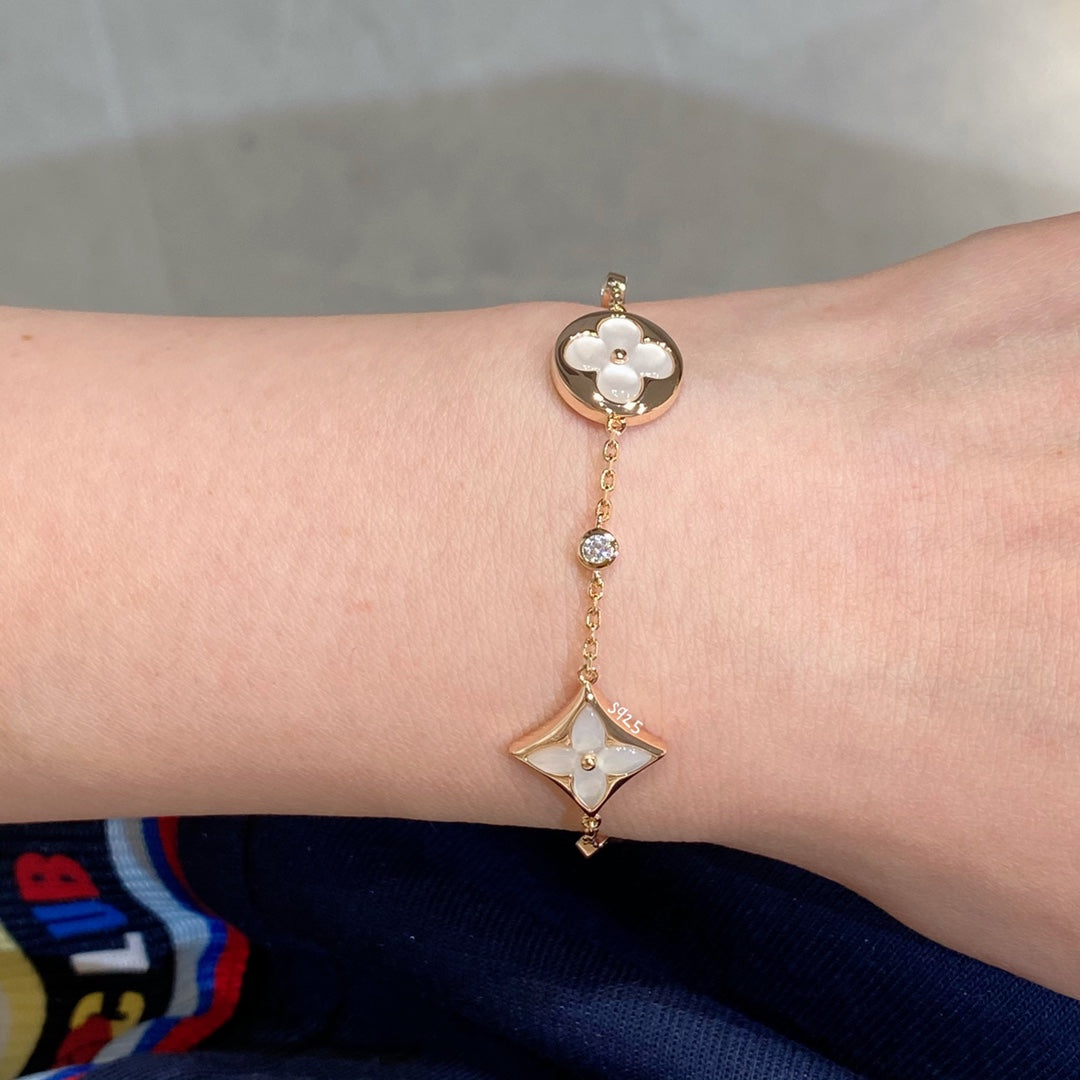 [Pearl Jewelrys]STAR AND SUN 4 MOTIF WHITE MOP PINK GOLD BRACELET