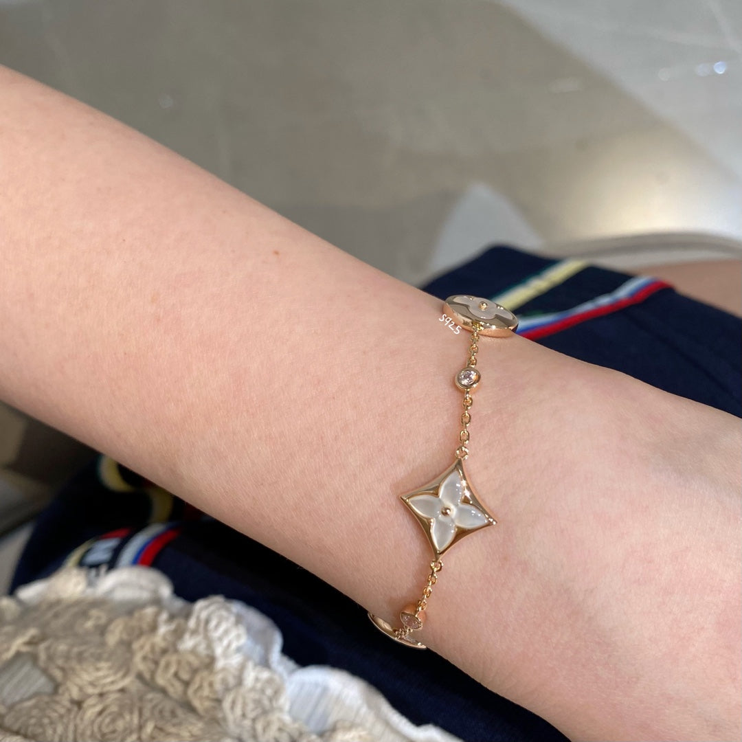 [Pearl Jewelrys]STAR AND SUN 4 MOTIF WHITE MOP PINK GOLD BRACELET